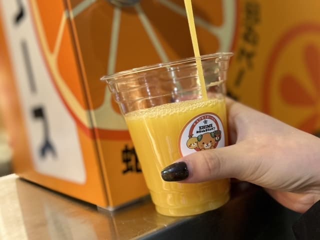 蛇口からみかんジュース